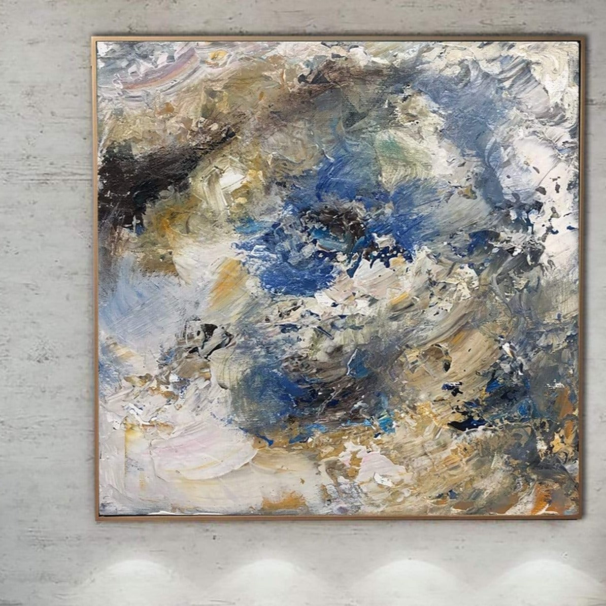 The image is a large abstract painting with a mix of blue, brown, and white colors, creating a dynamic and visually striking composition.