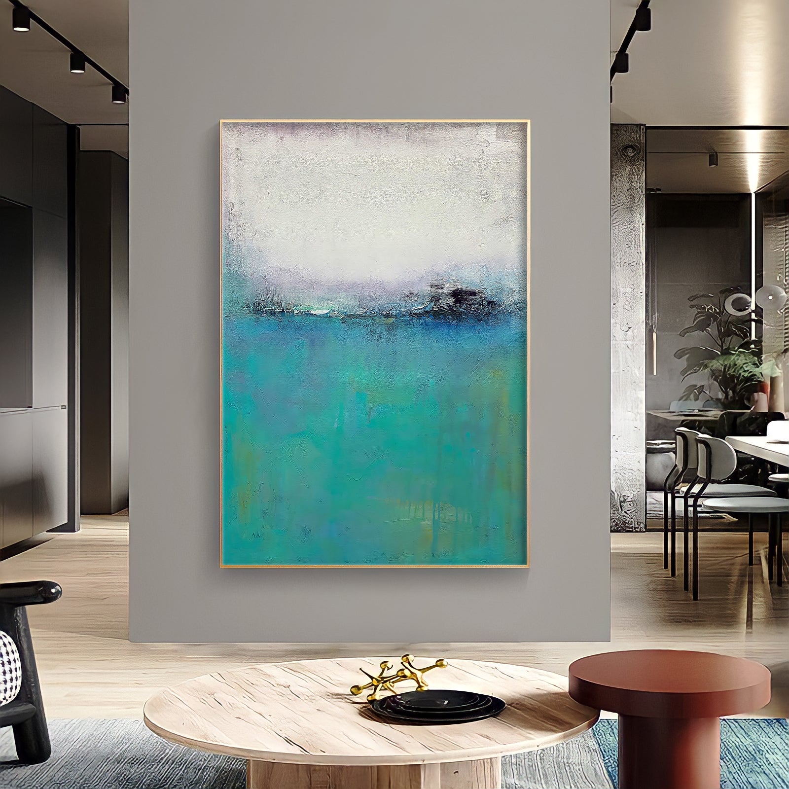 a painting hanging on a wall in a living room