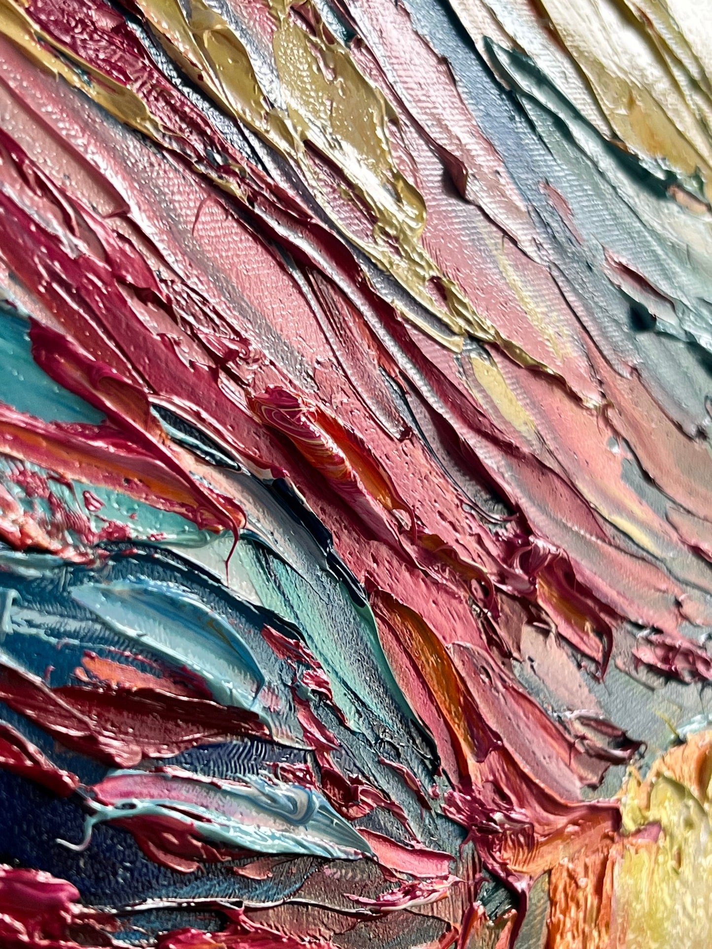 a close up of a painting with lots of colors