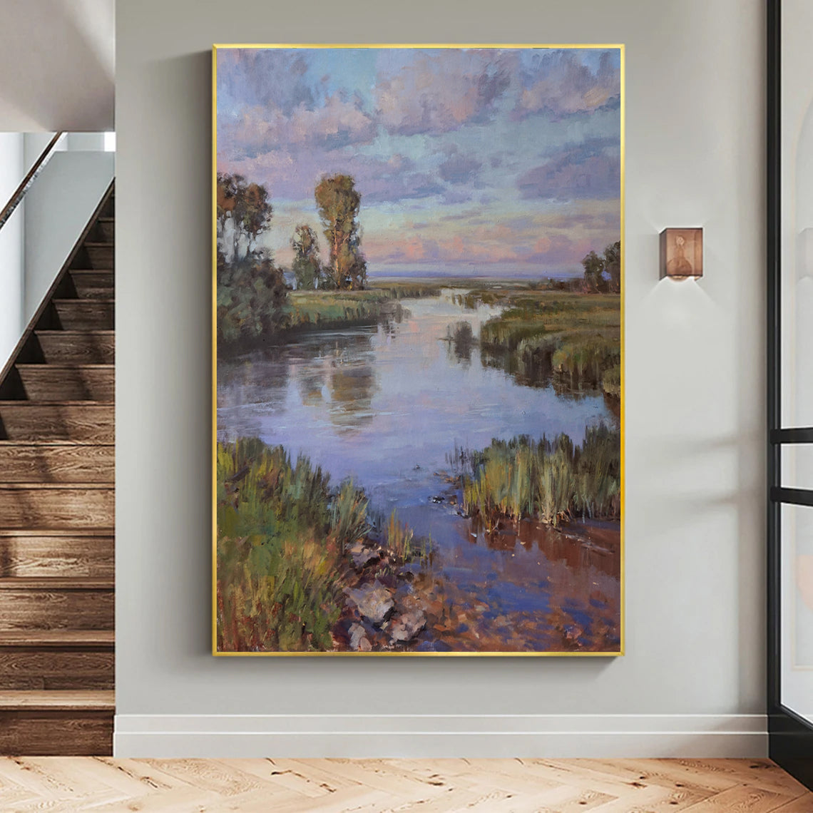 a painting hanging on a wall next to a stair case