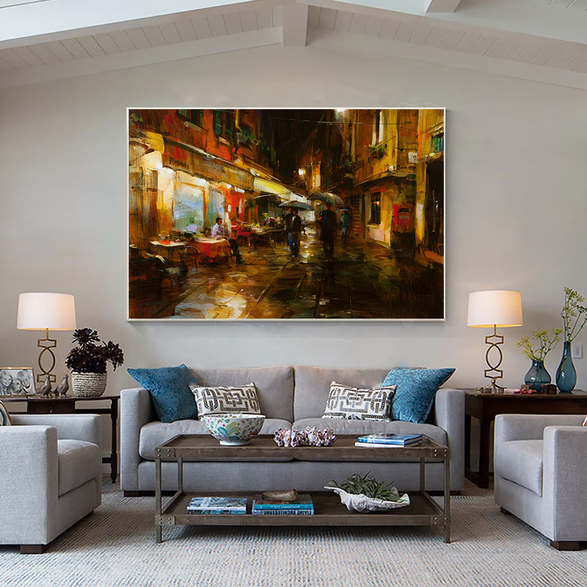 a living room filled with furniture and a painting on the wall