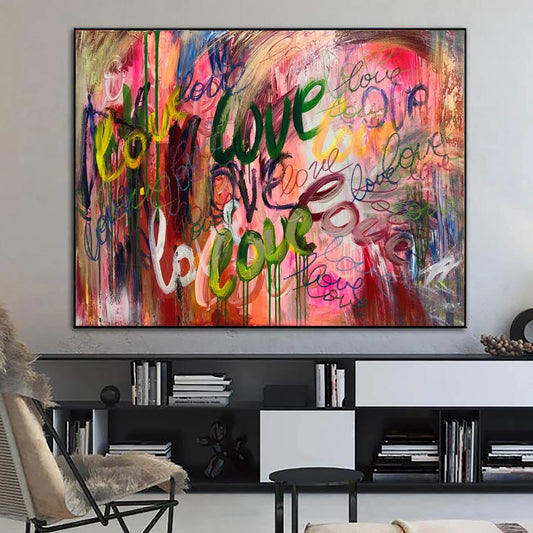a large, colorful abstract painting hanging on a wall in a living room.