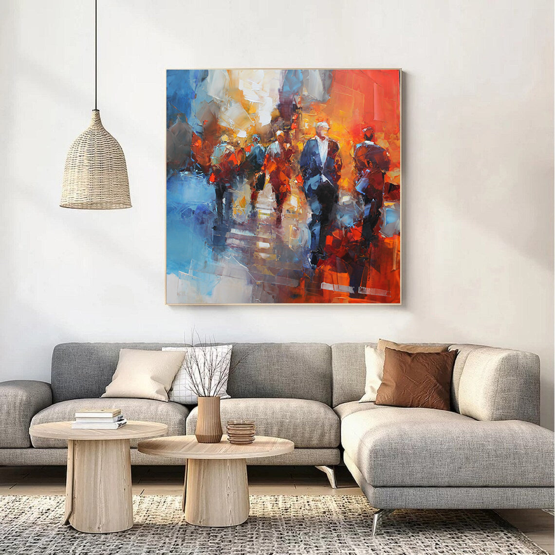 a living room with a large painting on the wall