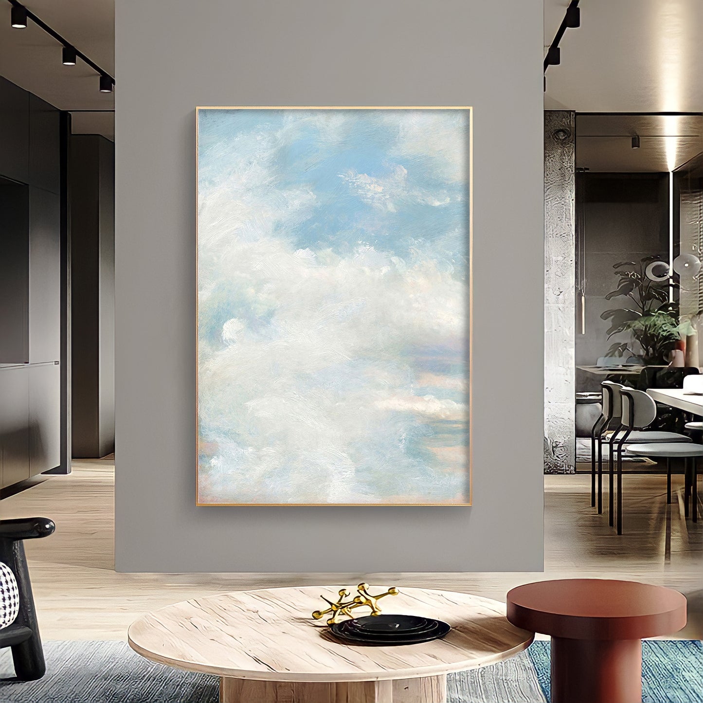 a painting hanging on a wall in a living room