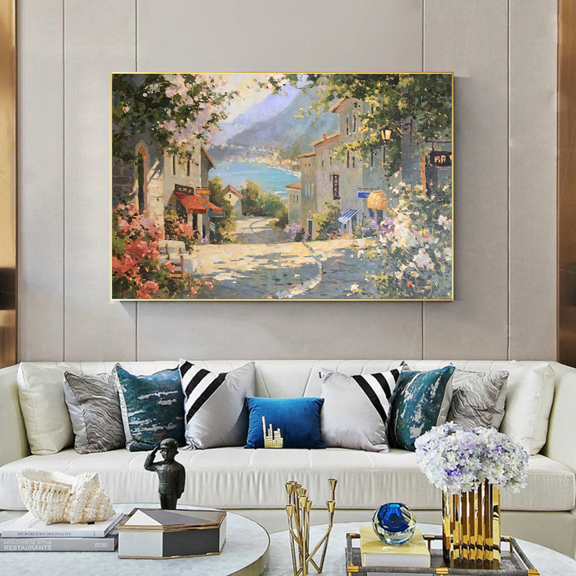 a living room filled with furniture and a painting on the wall