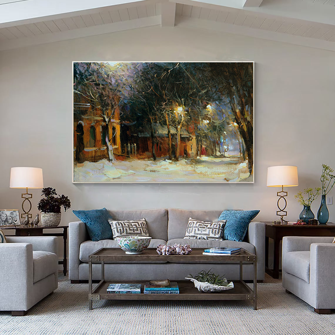 a living room filled with furniture and a painting on the wall