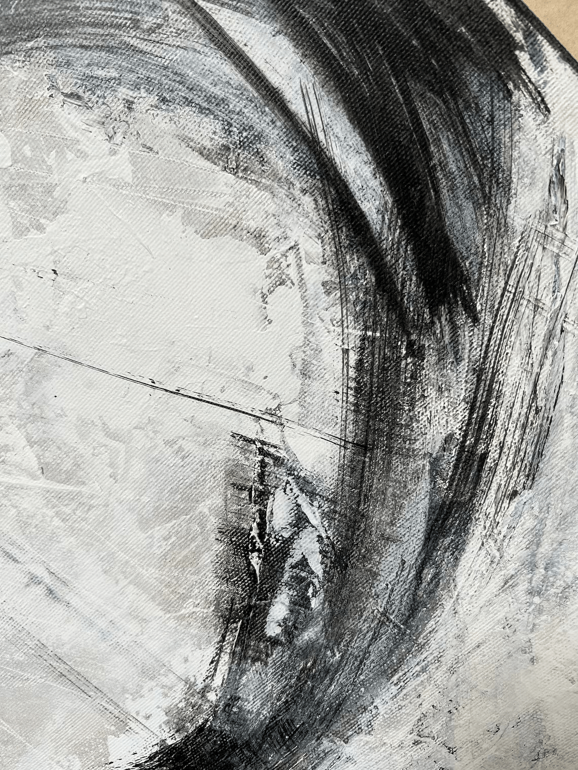 a black and white painting of a circular object