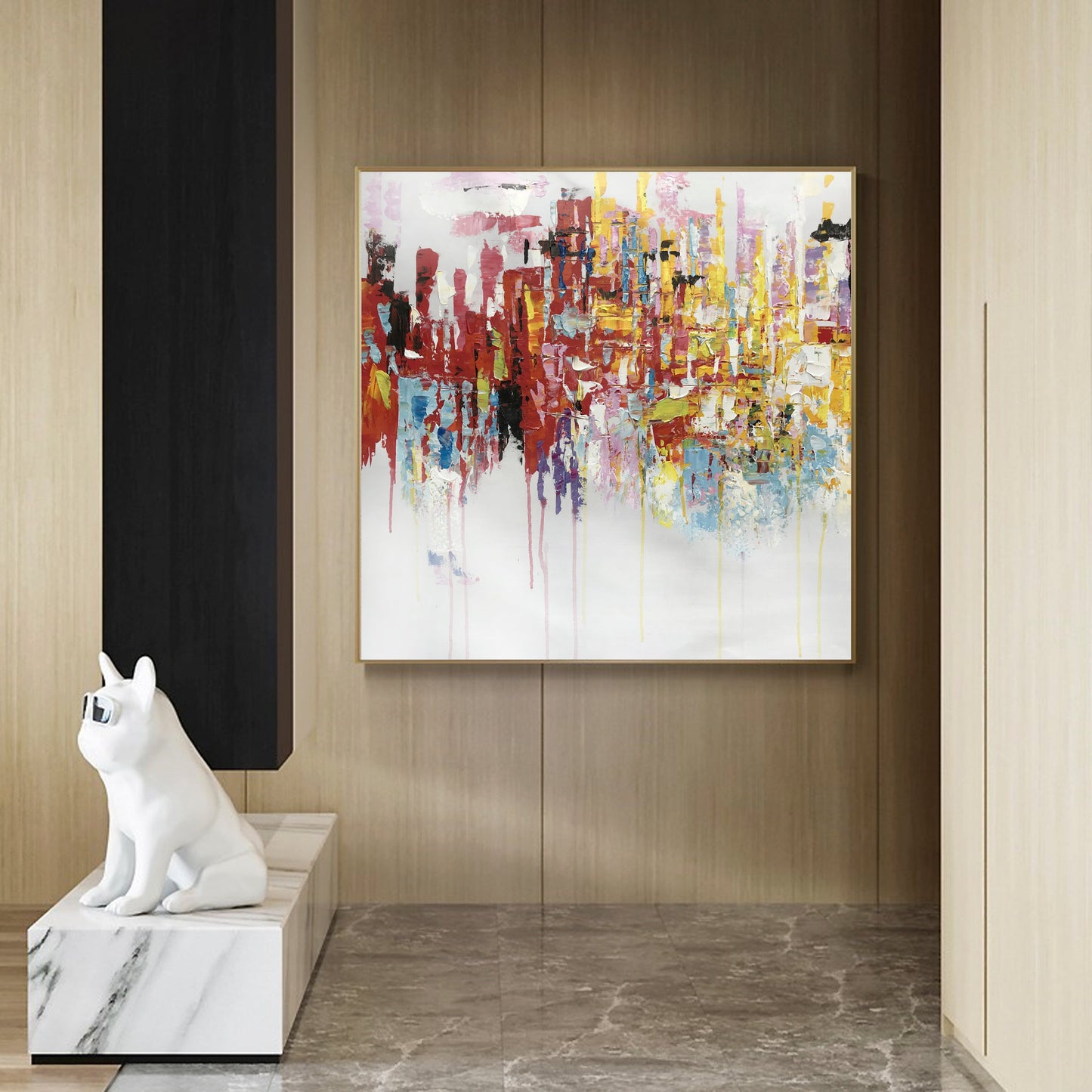 a white cat sitting on a marble block in front of a painting