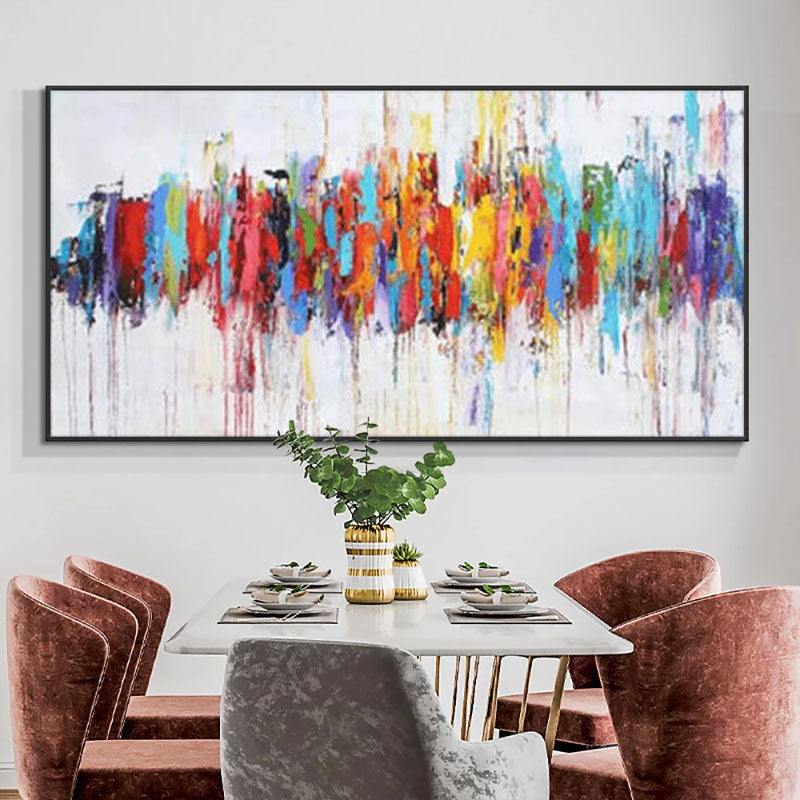 a dining room table with chairs and a painting on the wall