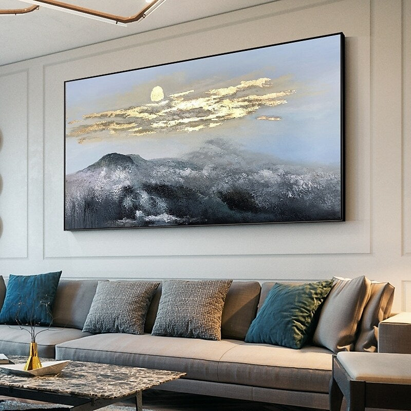 a living room filled with furniture and a painting on the wall