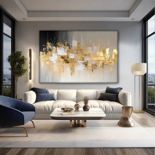 a modern living room with a large abstract painting featuring gold and white colors on the wall. The room is furnished with a white sofa, a blue armchair, and a coffee table. The room has large windows that provide a view of the city, and the overall design has a sleek and contemporary feel.