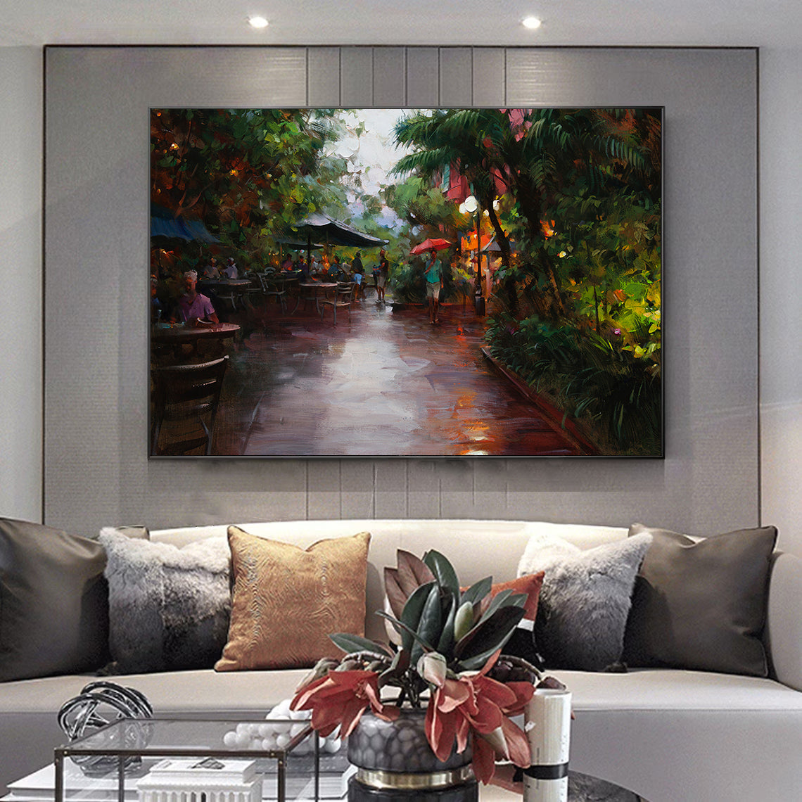 a living room with a couch and a painting on the wall