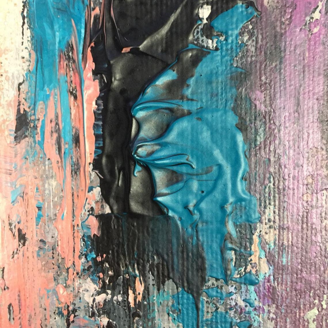 The image is an abstract painting with a mix of blue, black, and pink colors. The painting appears to be a textured surface with a variety of brushstrokes and splatters, creating a dynamic and expressive visual effect.
