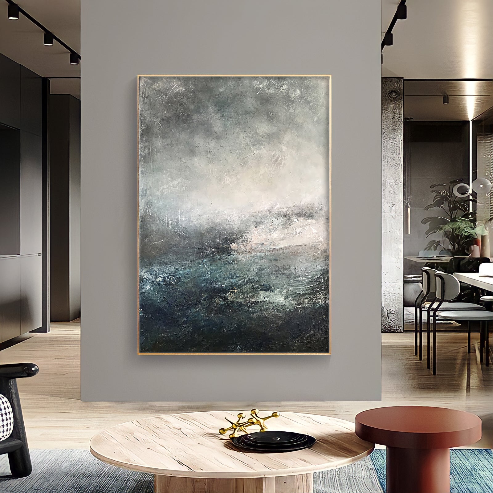 a living room with a large painting on the wall