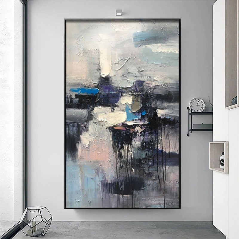 a painting hanging on a wall in a room