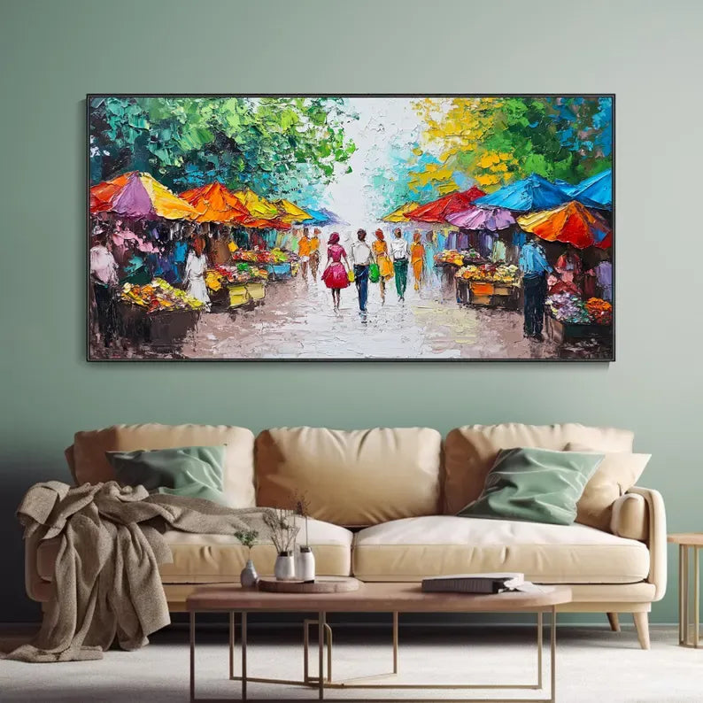 a lively street scene with people walking under colorful umbrellas, surrounded by various market stalls and vendors.