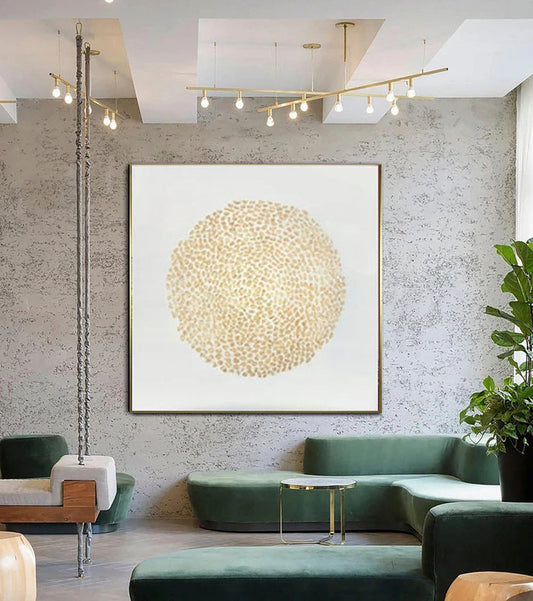 a living room filled with furniture and a painting on the wall