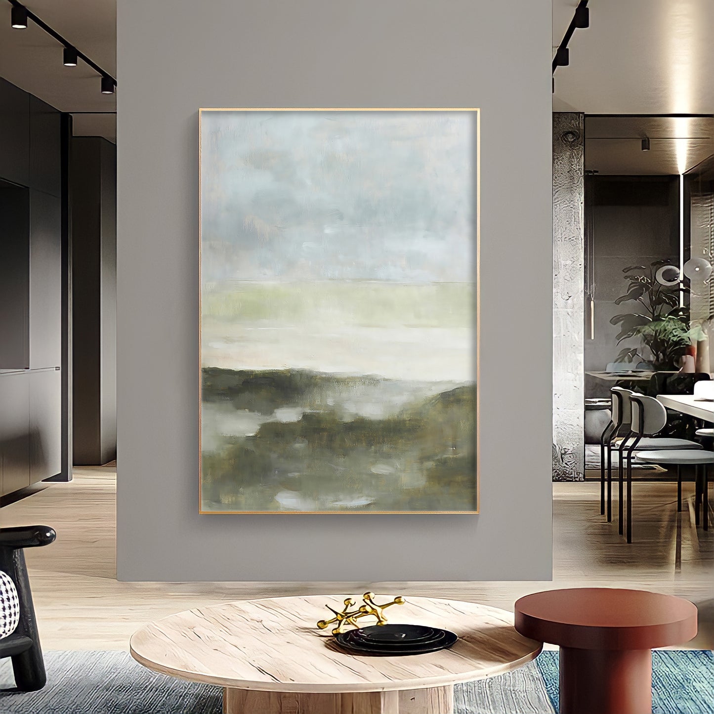 a painting hanging on a wall in a living room