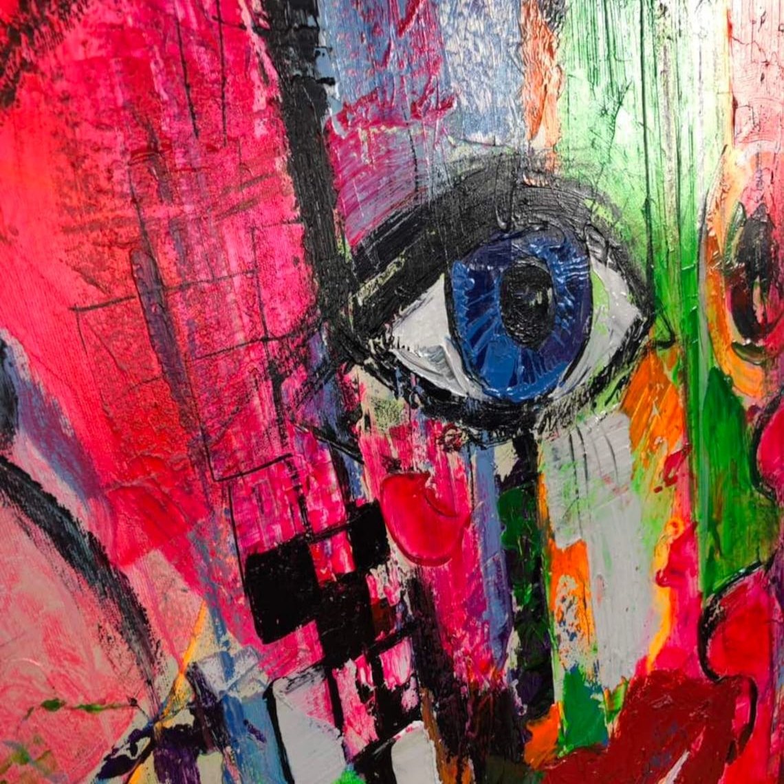 The image is a vibrant, abstract painting featuring a large eye surrounded by bold, colorful brushstrokes in shades of red, pink, blue, green, and orange.