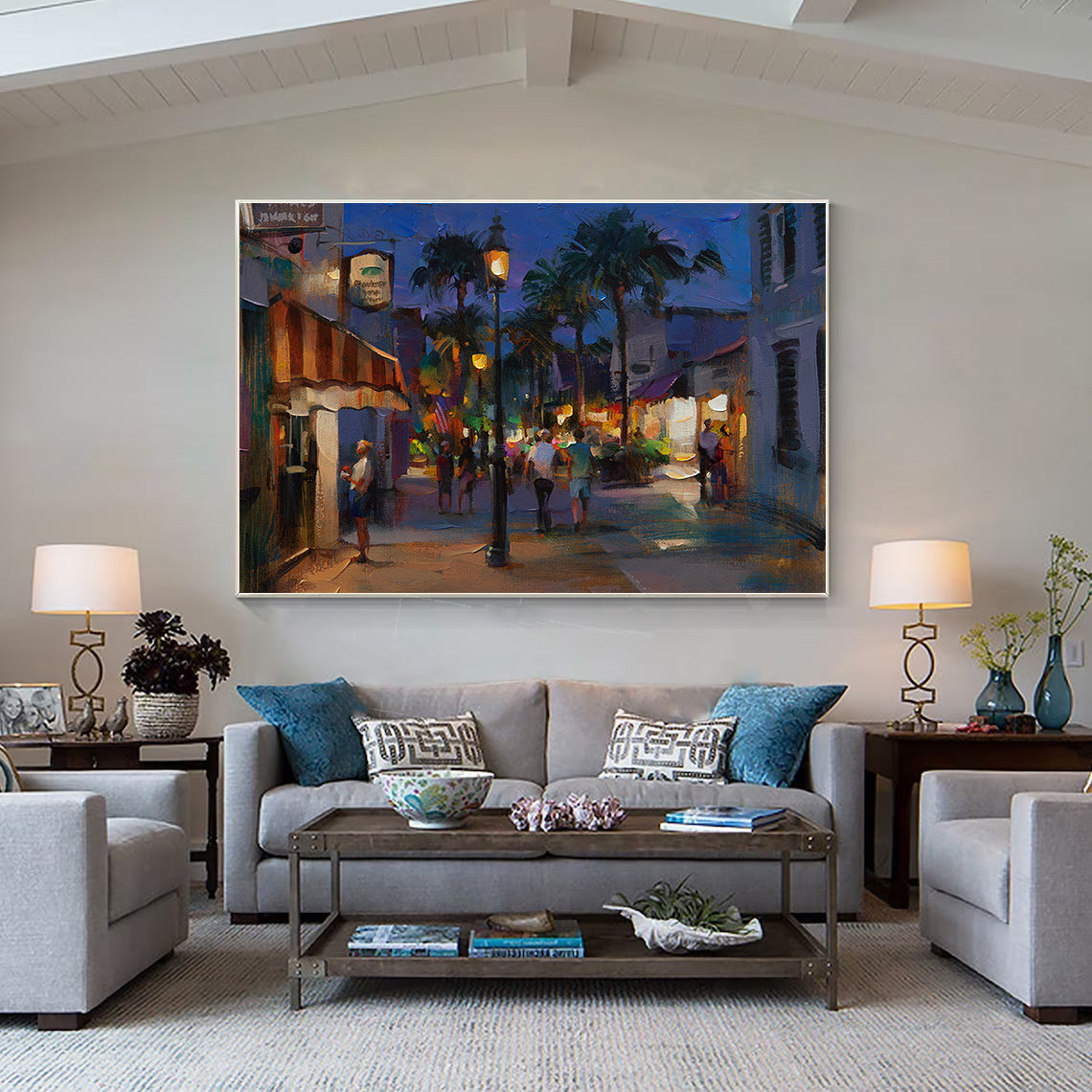 a living room filled with furniture and a painting on the wall