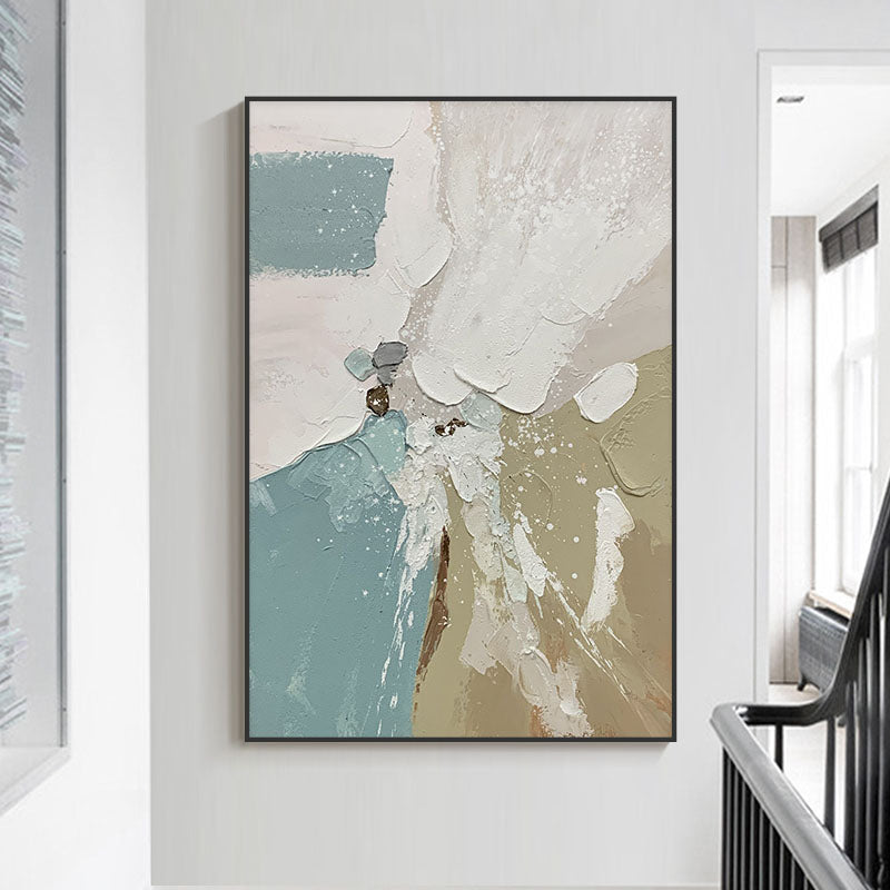 a painting hanging on a wall next to a stair case