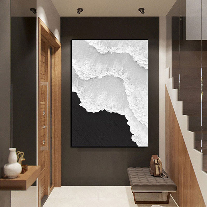 a large painting hanging on the wall of a hallway