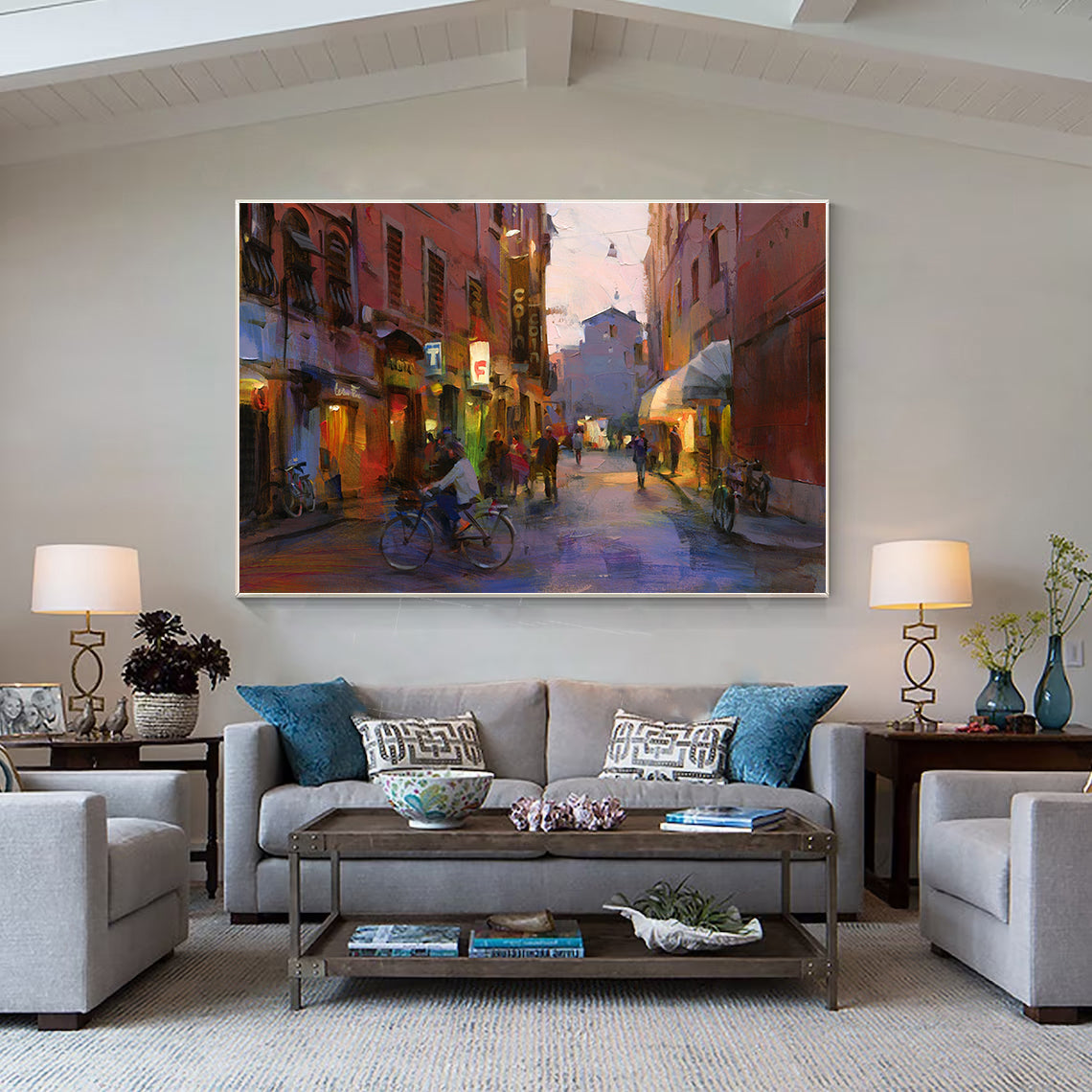 a living room filled with furniture and a painting on the wall