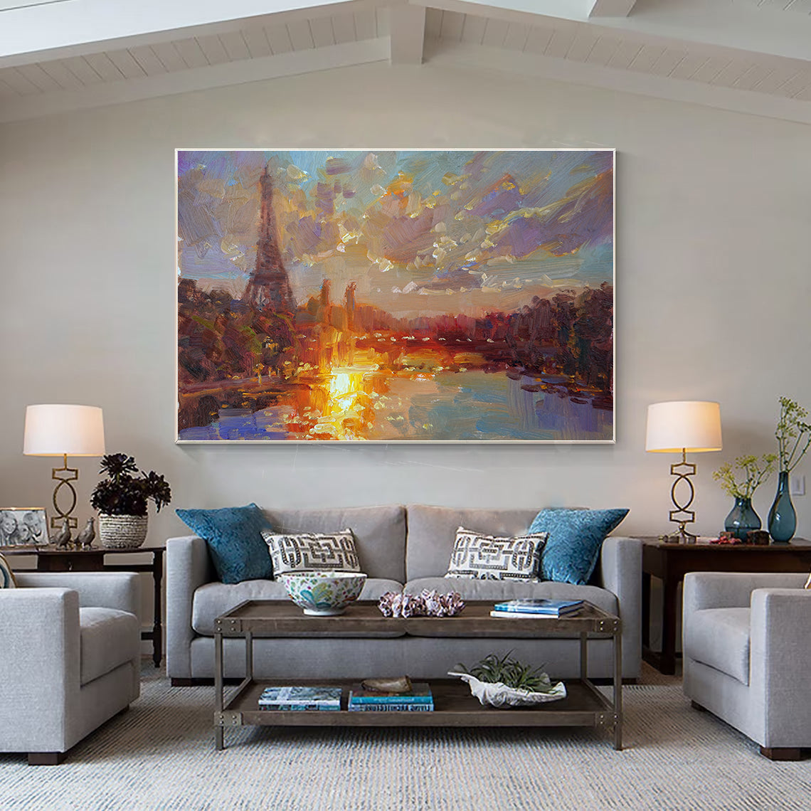 a living room filled with furniture and a painting on the wall