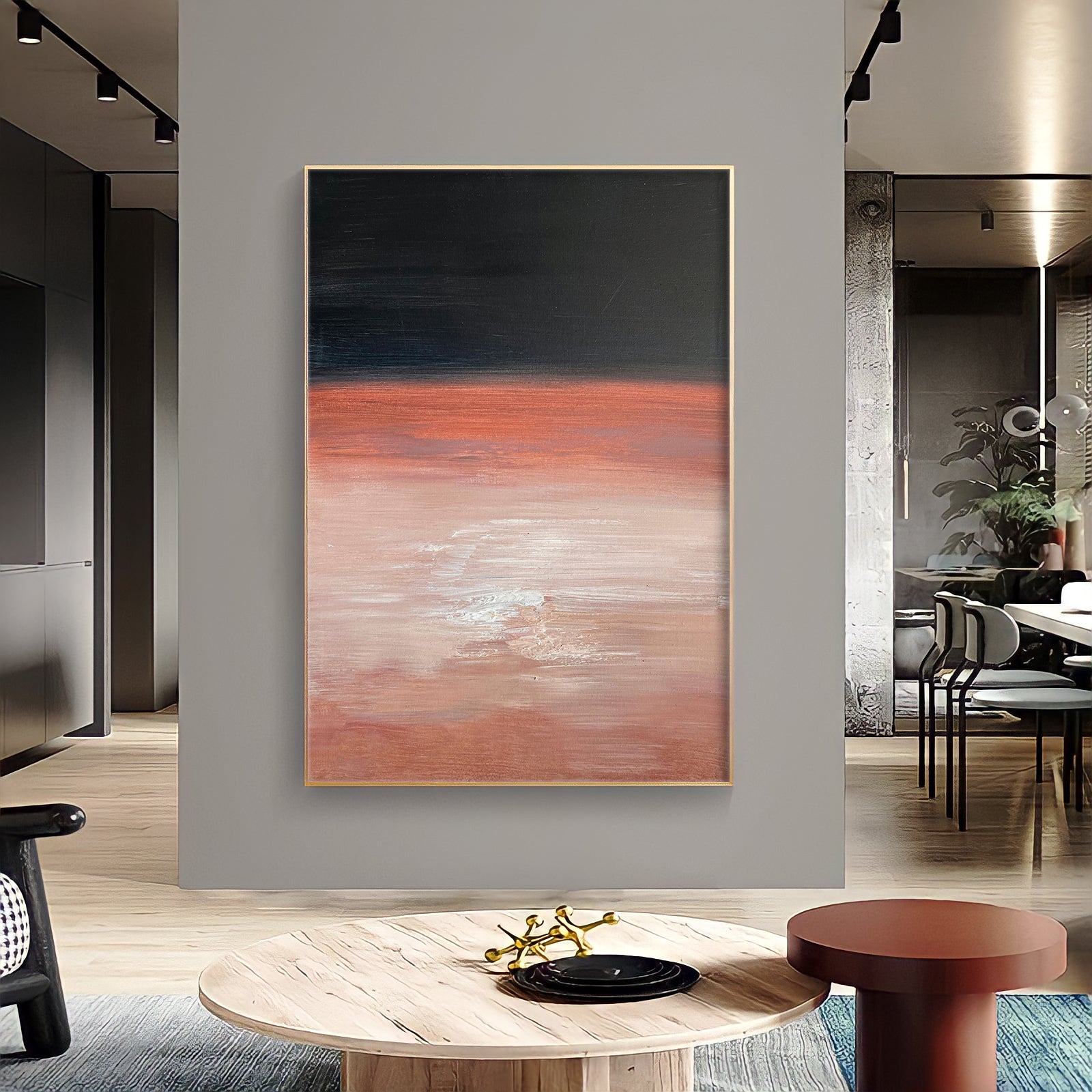 a living room with a large painting on the wall