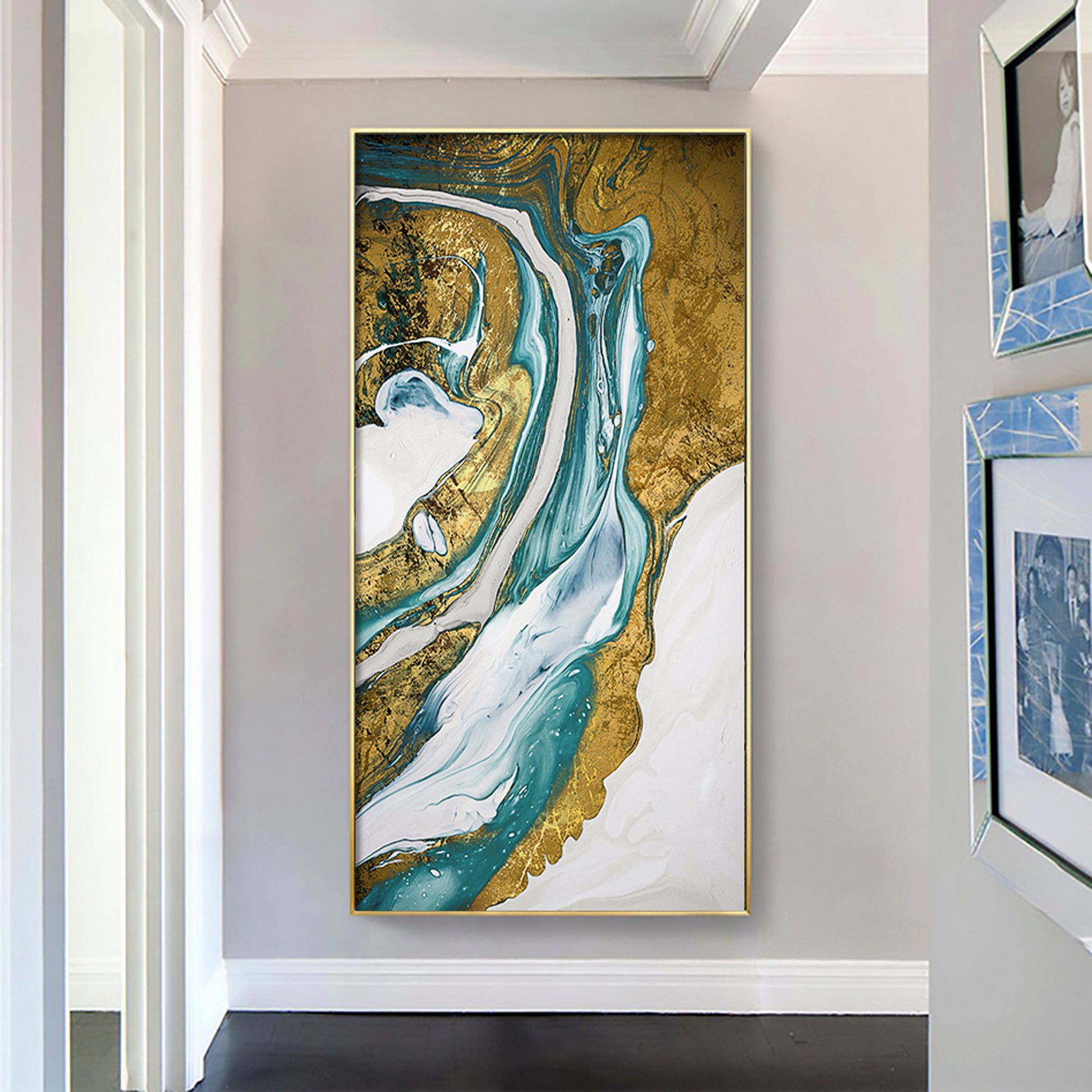 a painting hanging on a wall next to a doorway