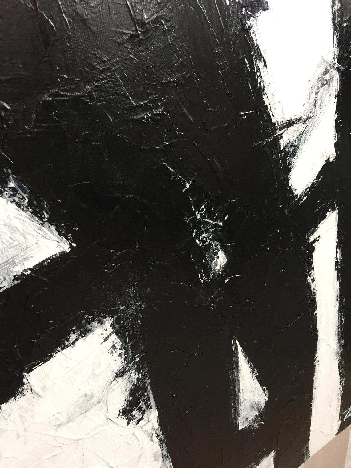 a black and white painting on a wall