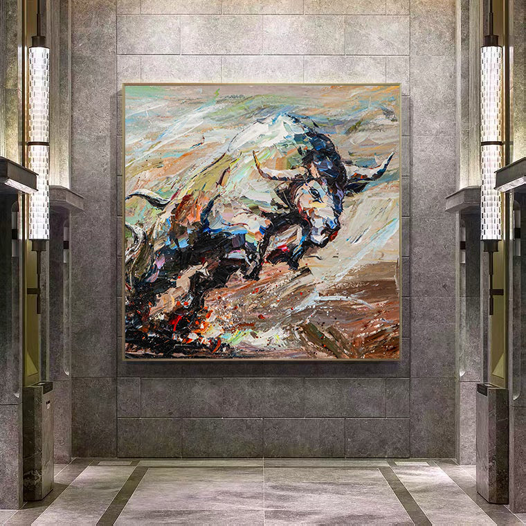 a painting of a bull on a wall