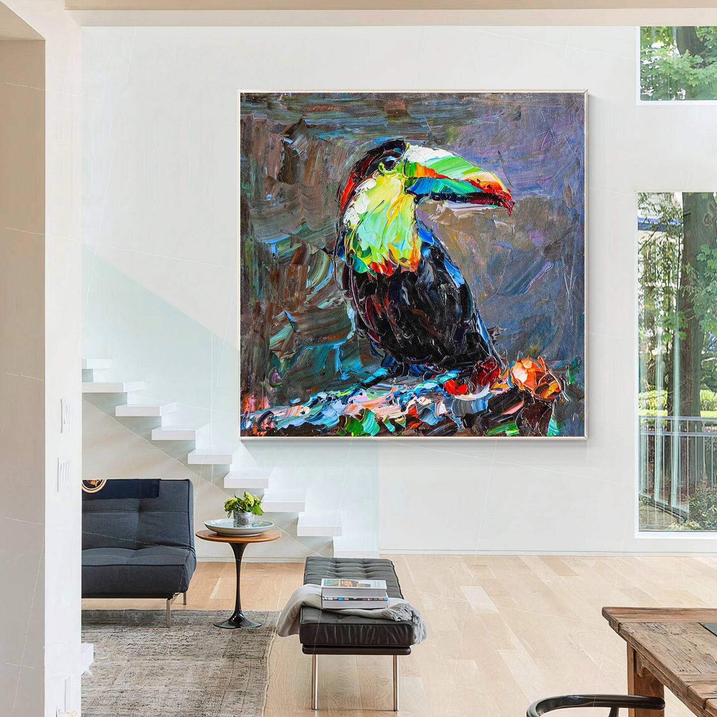 a living room with a painting of a toucan on the wall