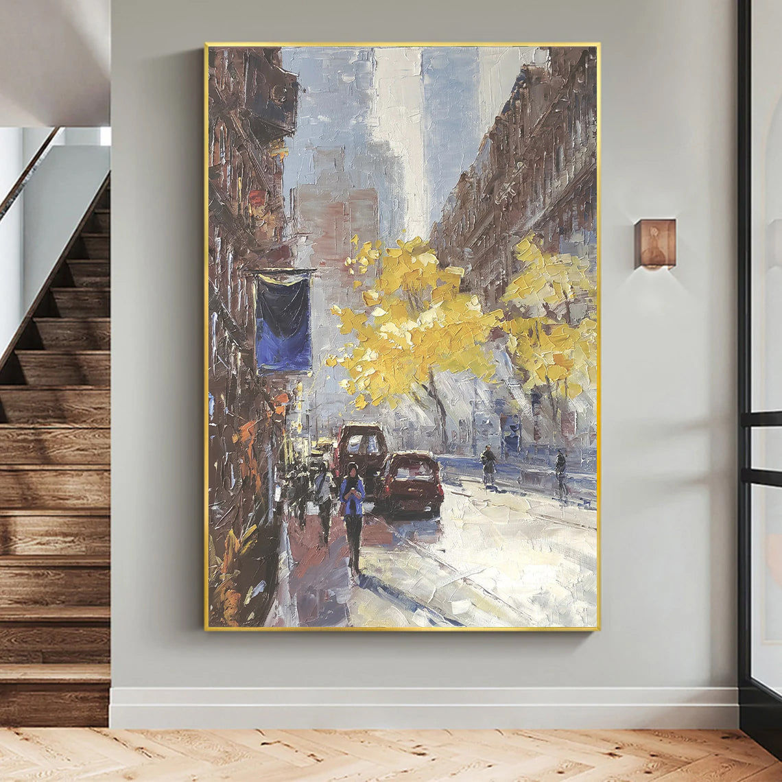 a painting hanging on a wall next to a stair case