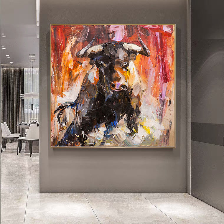 a painting of a bull in a room