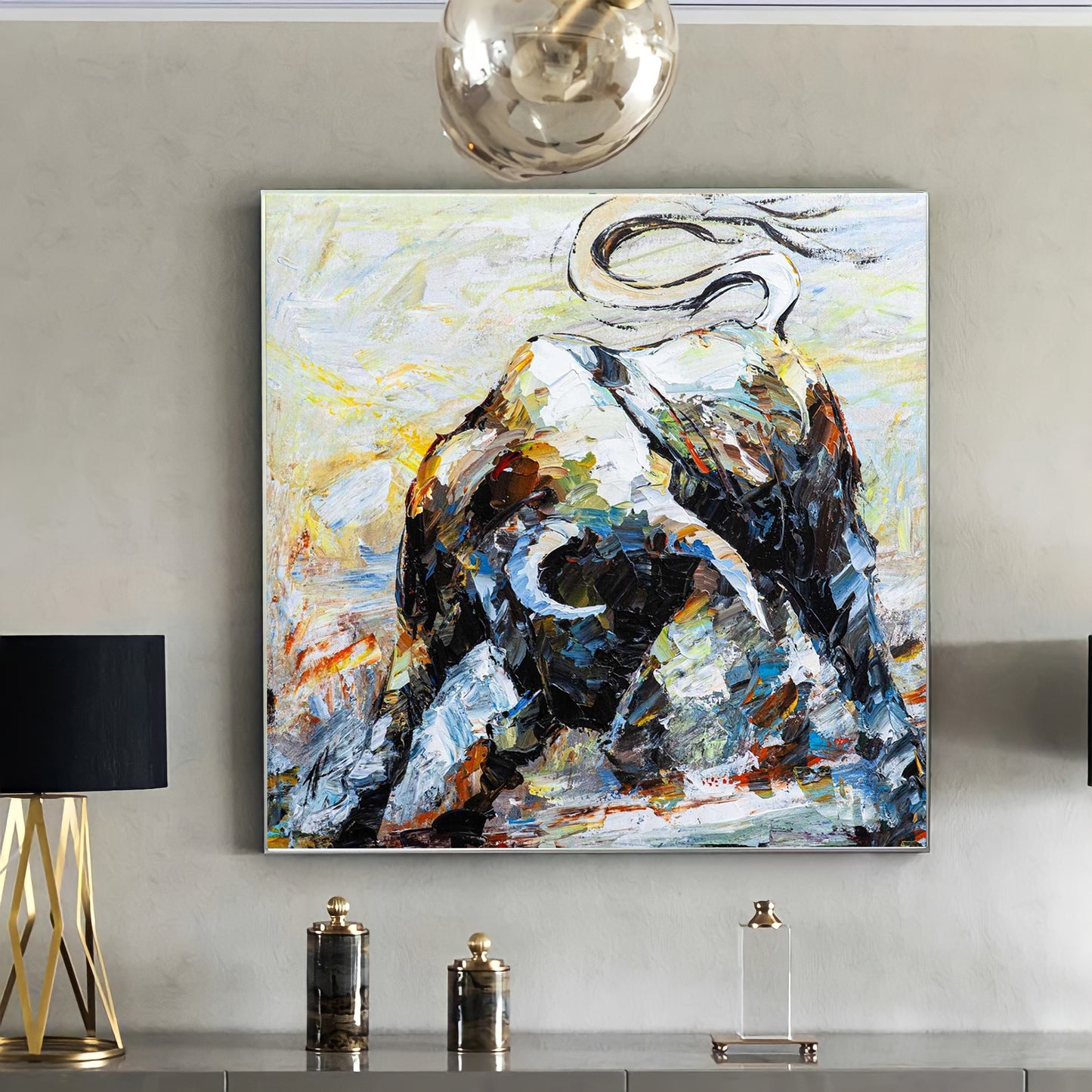 a painting of a horse is hanging on a wall