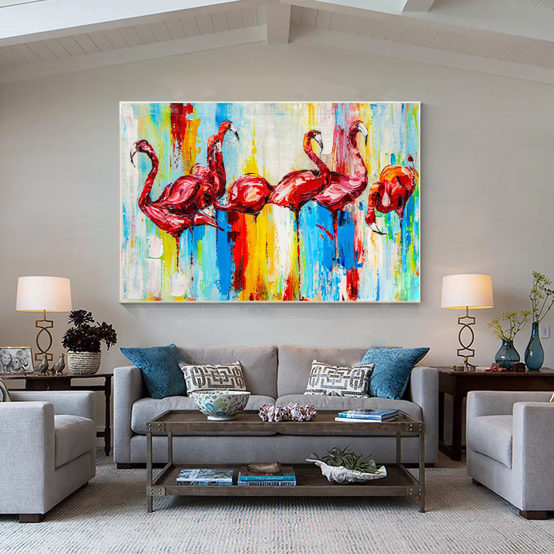 a living room filled with furniture and a painting on the wall