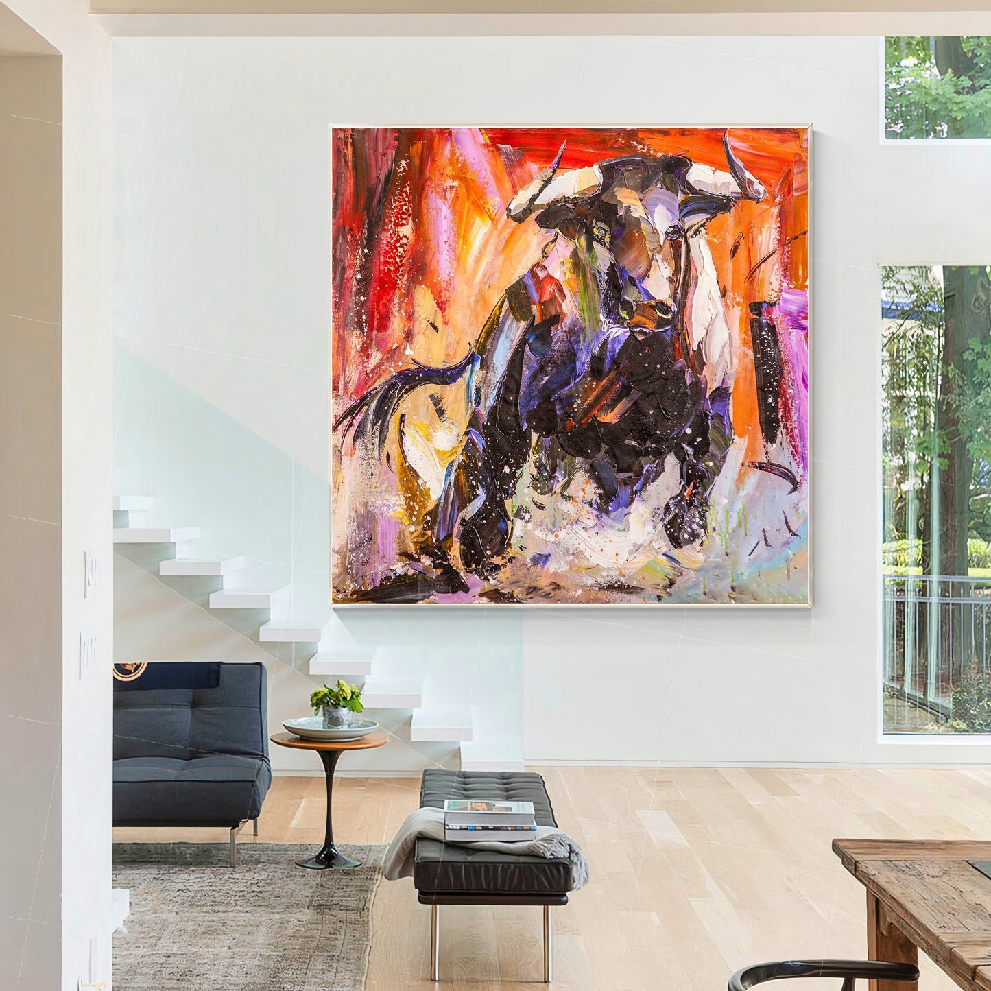 a painting hanging on the wall of a living room