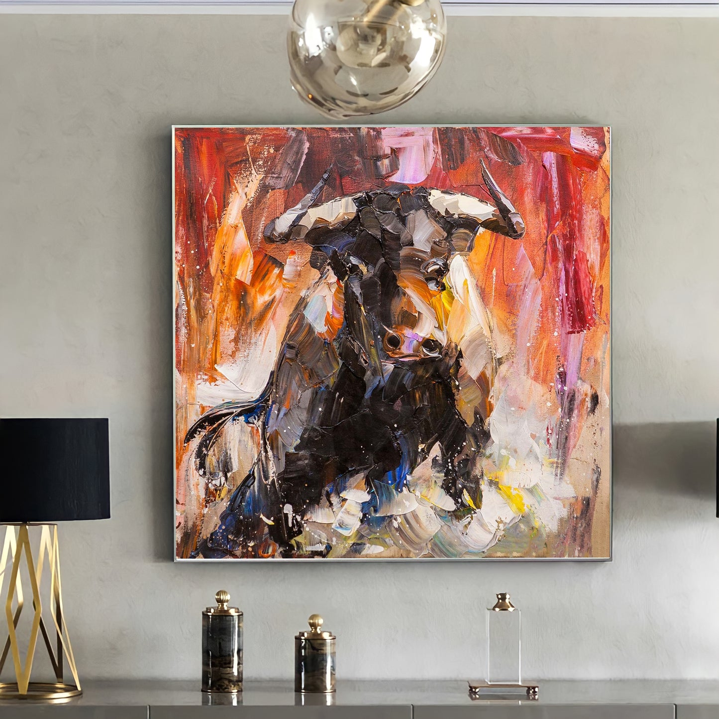 a painting hanging on the wall of a living room