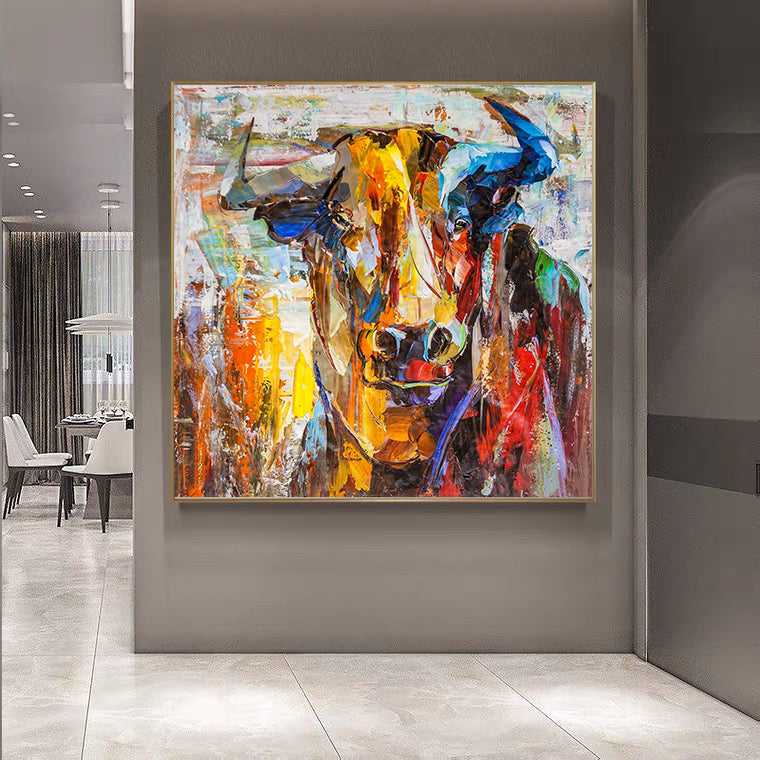 a painting of a bull in a room