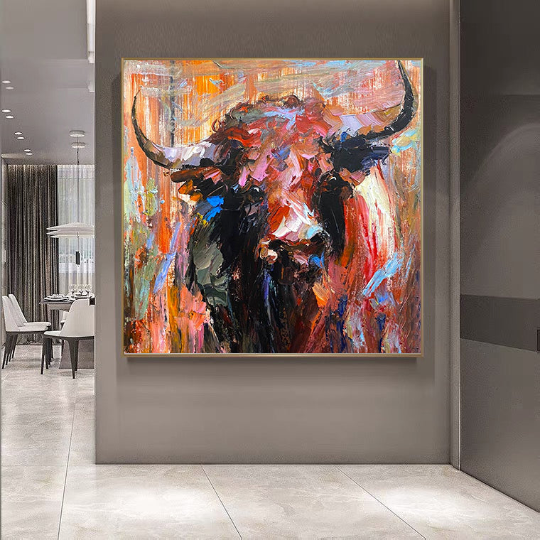 a painting of a bull in a room