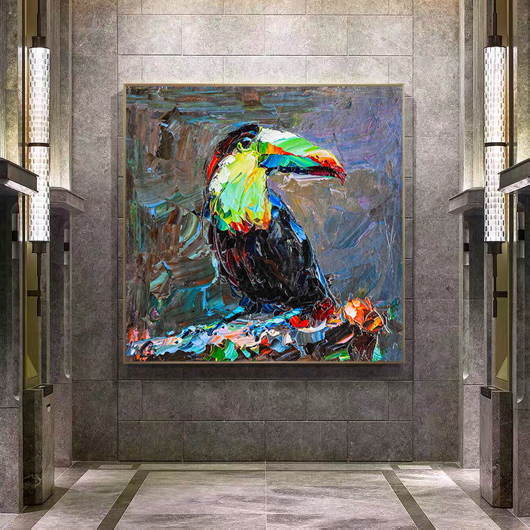 a painting of a toucan bird on a wall