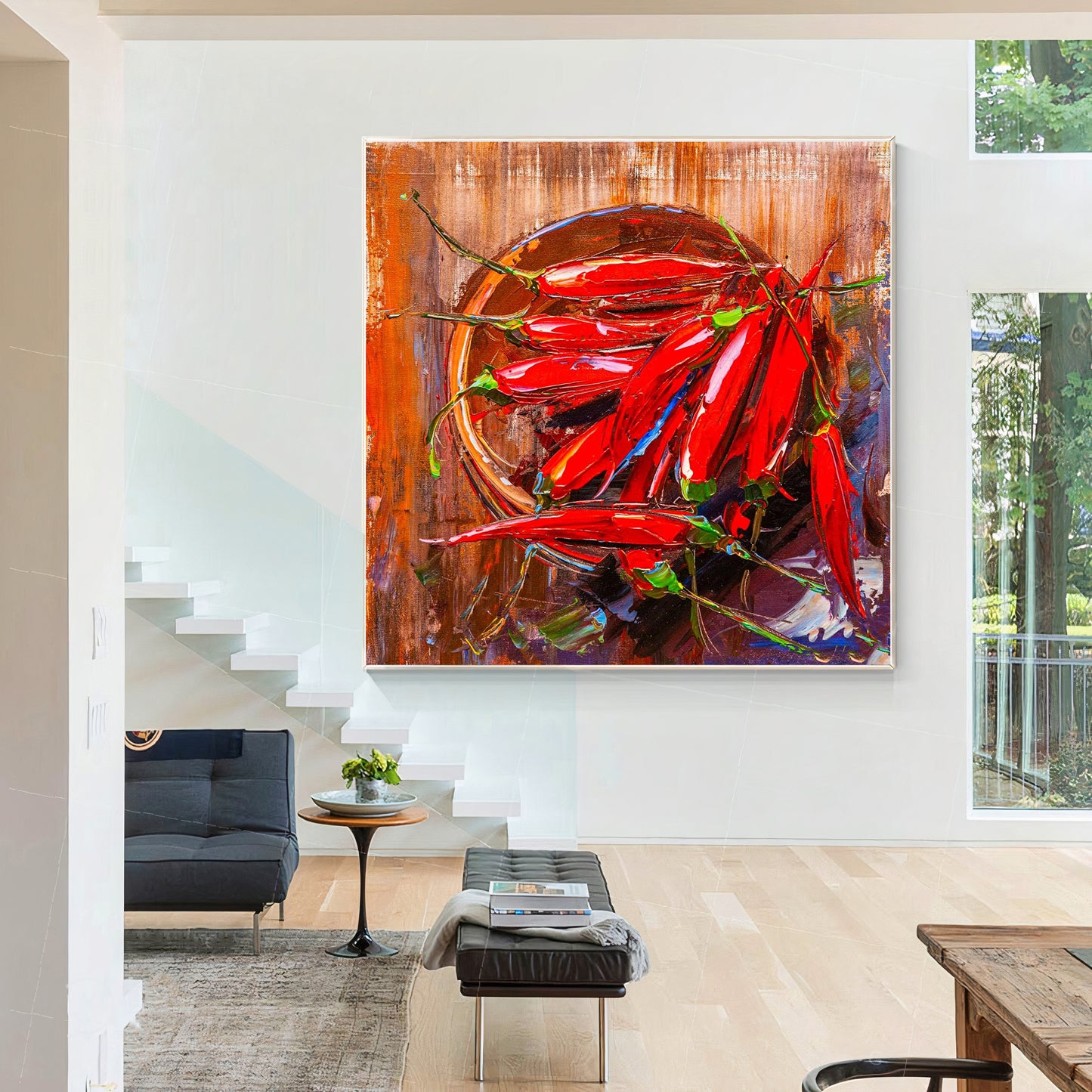 a living room with a couch and a painting on the wall