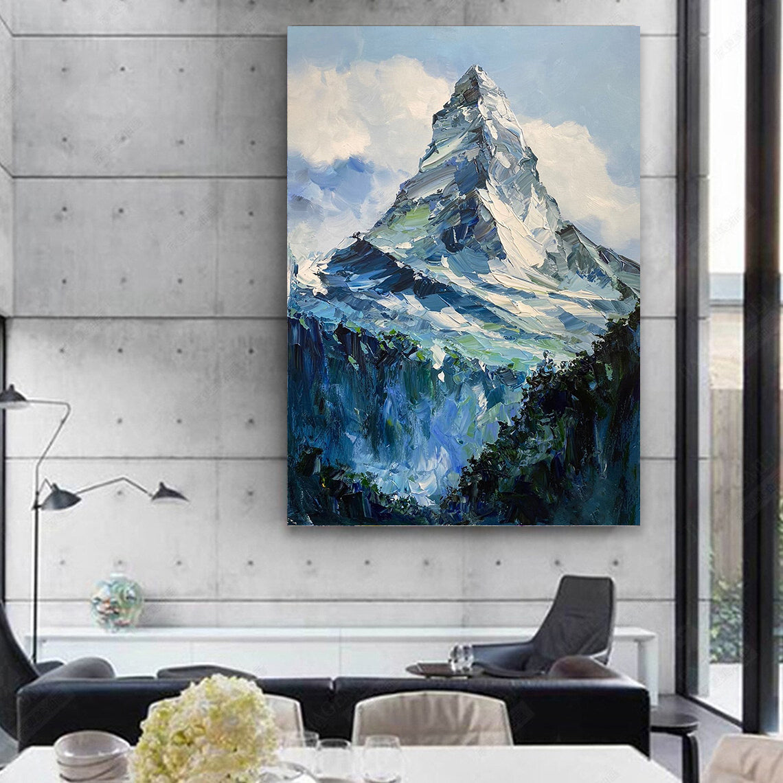 a painting of a mountain in a living room